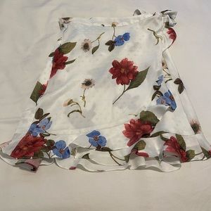 Show me your Mumu mini wrap skirt.